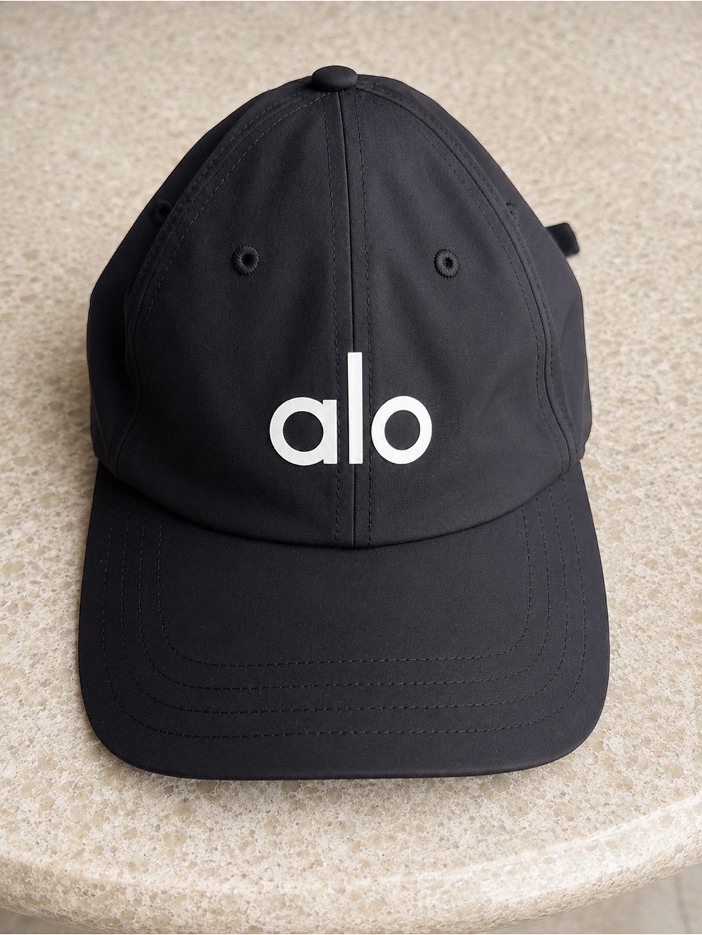 ALO Yoga Black Cap with White 'alo' Logo